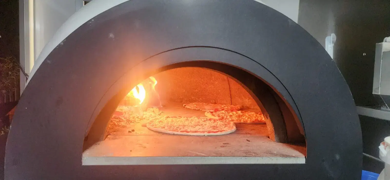 Wood-fired pizza from our mobile oven
